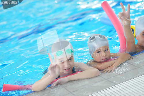 Image of children group  at swimming pool