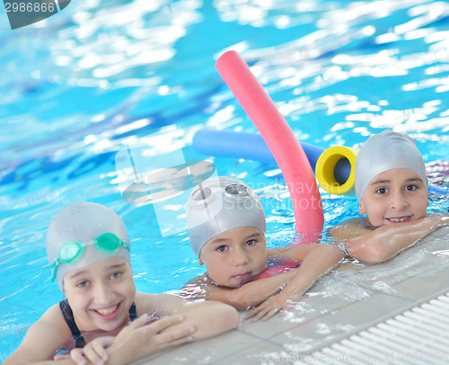 Image of children group  at swimming pool
