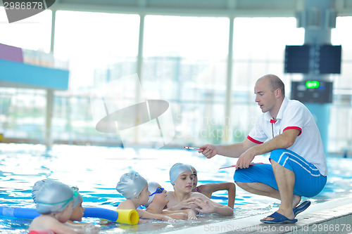 Image of children group  at swimming pool
