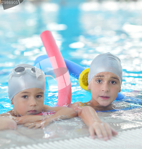 Image of children group  at swimming pool
