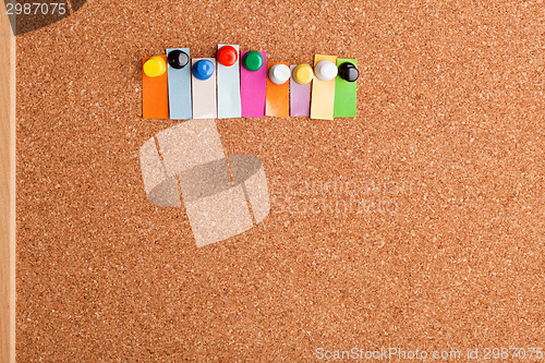 Image of Cork board and colorful heading for nine letter word 