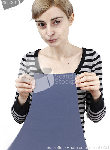 Image of Woman holding a paper