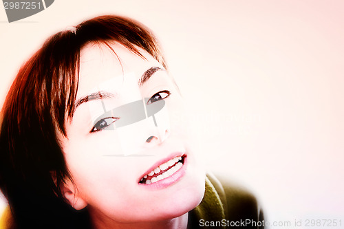 Image of Young woman in bed