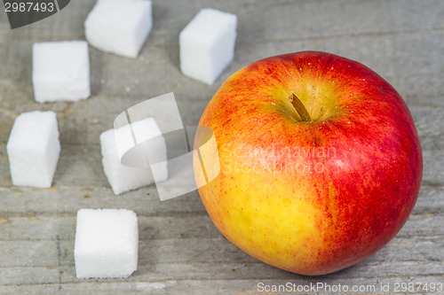 Image of apple and lump sugar