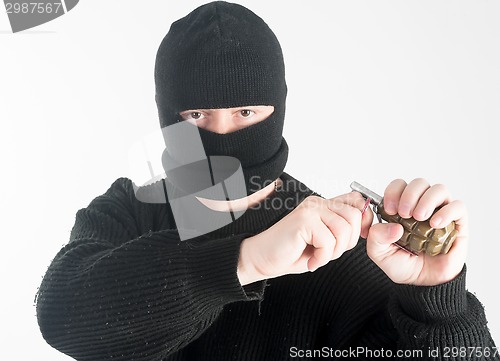 Image of Masked man with grenade