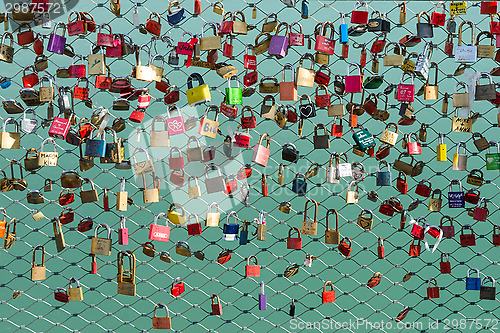 Image of A lot of padlocks on the bridge