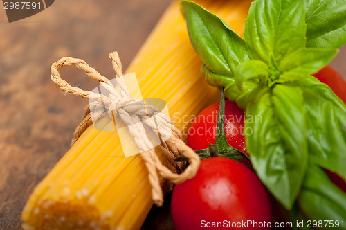 Image of Italian spaghetti pasta tomato and basil