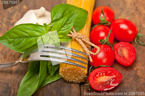 Image of Italian spaghetti pasta tomato and basil