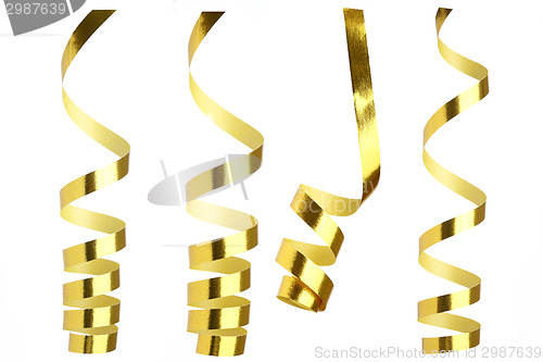 Image of Golden ribbons in front of white background