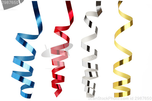 Image of Colorful ribbons in front of white background