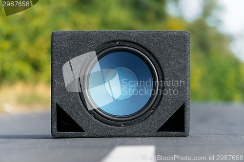 Image of Subwoofers on the road outdoors