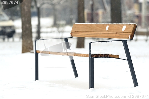 Image of Wooden bench at winter