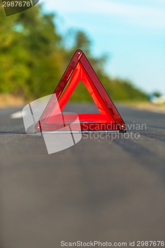 Image of Red triangle of a car