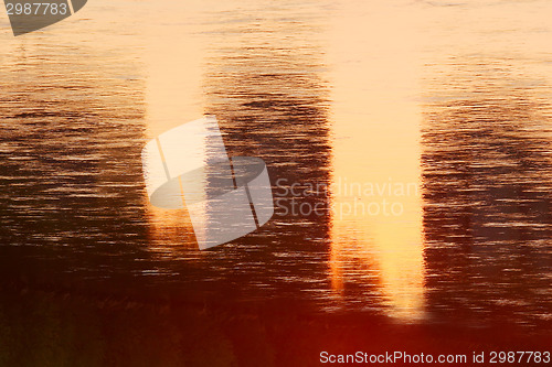 Image of Sunlight reflecting on water surface