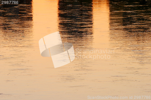 Image of Close up of sunset water reflection