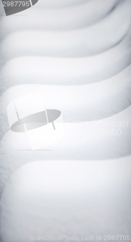 Image of Abstract of chairs covered in snow