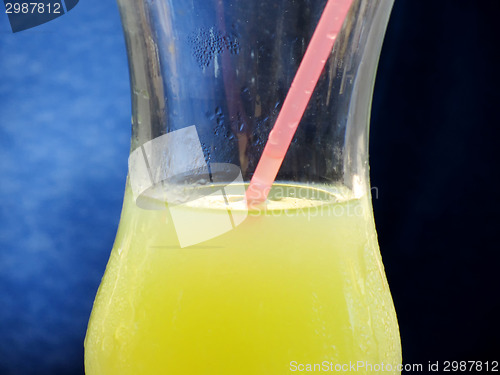 Image of Glass of juice with straw