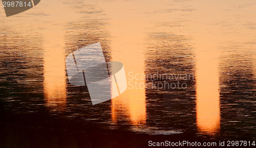 Image of Sunlight reflecting on water surface