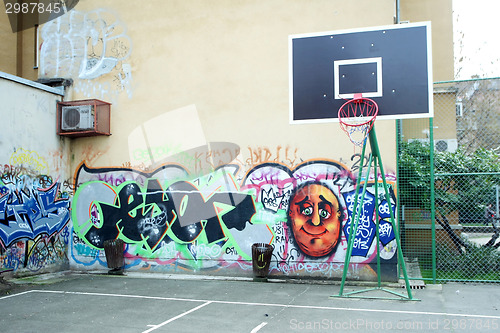 Image of Basketball yard painted in graffiti