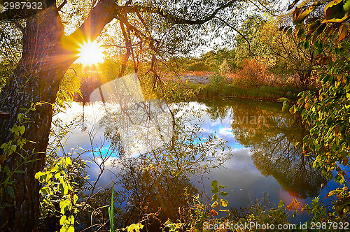 Image of Colorful autumn sunset on the river
