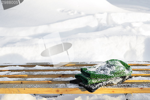 Image of snow-covered bench