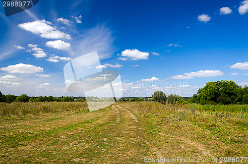 Image of Landscape with dirt road in the countryside