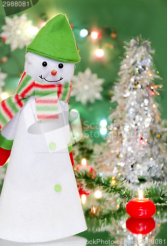 Image of Christmas new year decoration with snowman and candles 