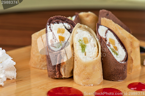 Image of pancake roll with marmalade