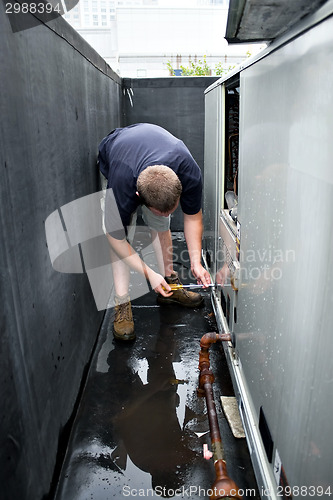 Image of HVAC Technician Working