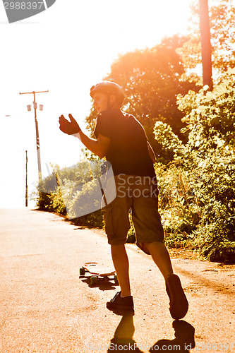 Image of Longboarding Teen Silhouette
