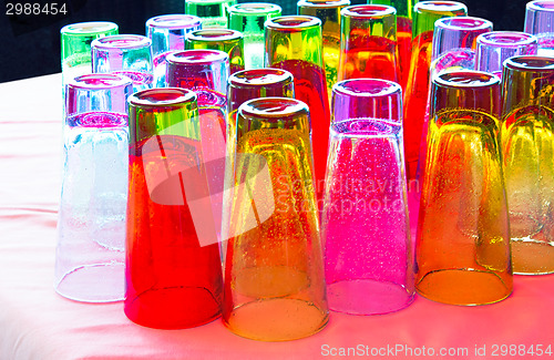 Image of Beautiful colored glasses on the table surface.