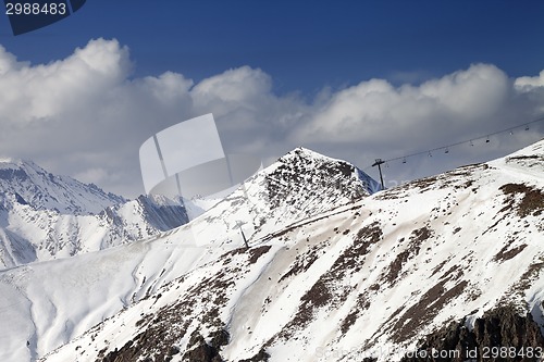 Image of Off-piste slope and chair-lift in little snow year