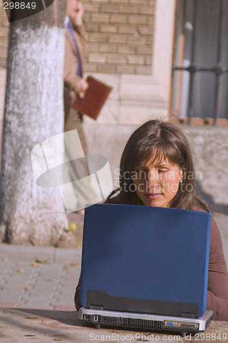 Image of Browsing the internet outdoor