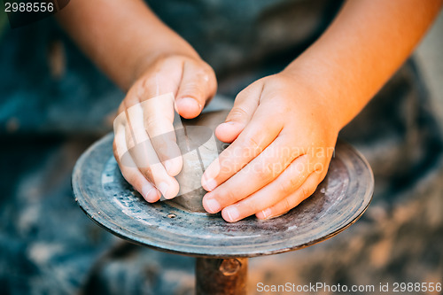 Image of Child Potter And Clay Craft