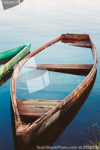 Image of Old Sunken Wooden Fishing Boat In River. Belarusian Nature