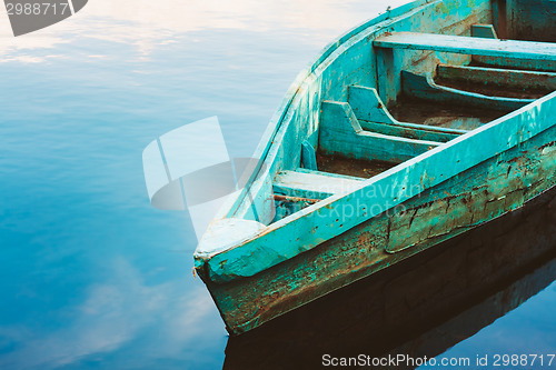 Image of Old Wooden Fishing Boat In River