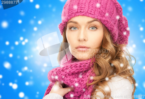 Image of close up of young woman in winter clothes