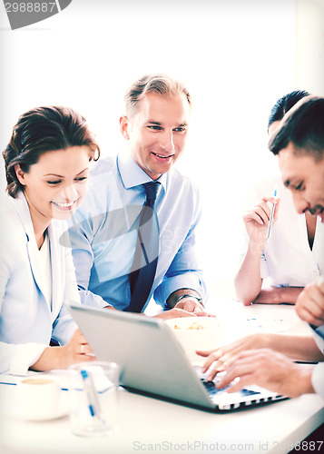 Image of businessman with team on meeting in office