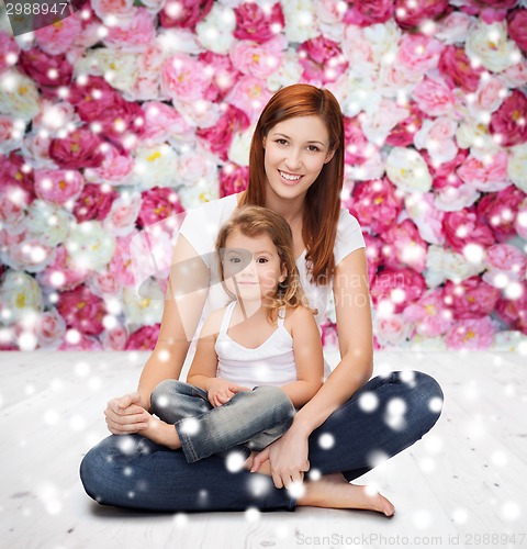 Image of happy mother with little girl