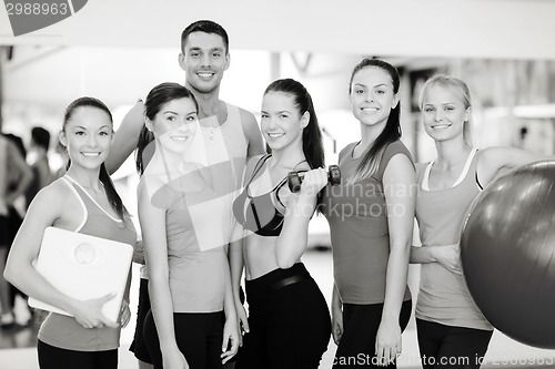 Image of group of smiling people in the gym