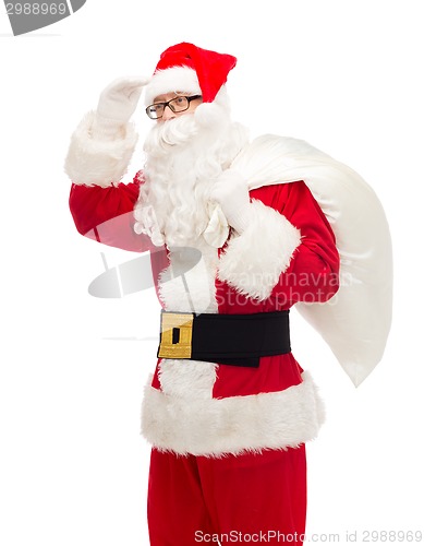 Image of man in costume of santa claus with bag