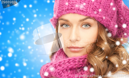 Image of close up of young woman in winter clothes