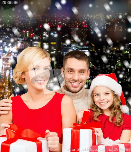 Image of happy family with gift boxes