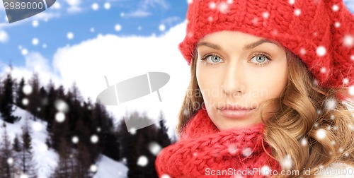 Image of close up of young woman in winter clothes