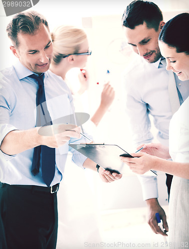 Image of business team having discussion in office