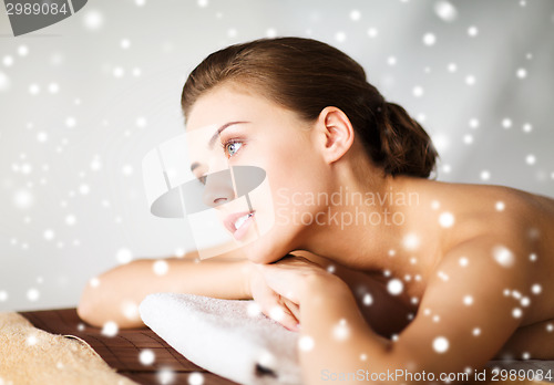 Image of beautiful young woman in spa