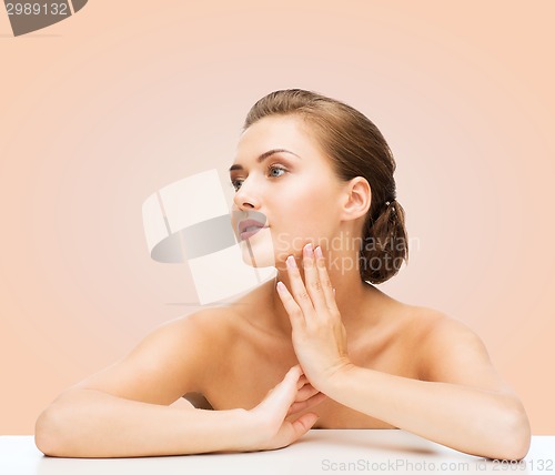 Image of smiling woman with clean perfect skin