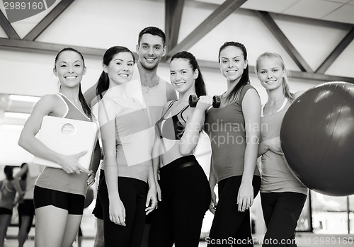 Image of group of smiling people in the gym