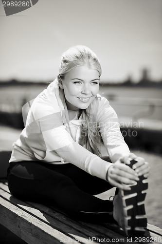 Image of woman doing sports outdoors