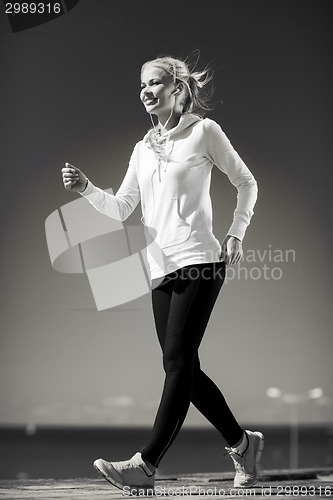 Image of woman doing sports outdoors